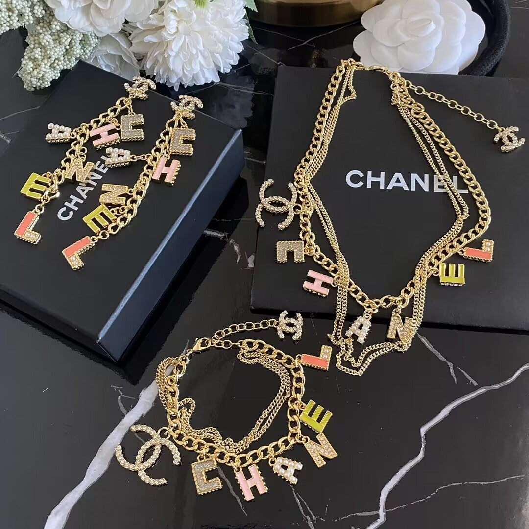 Double Gold Logo - Mourimani Beauty & Accessories